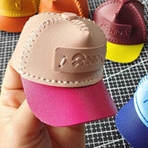 NIO NOMI Peaked Cap Decoration