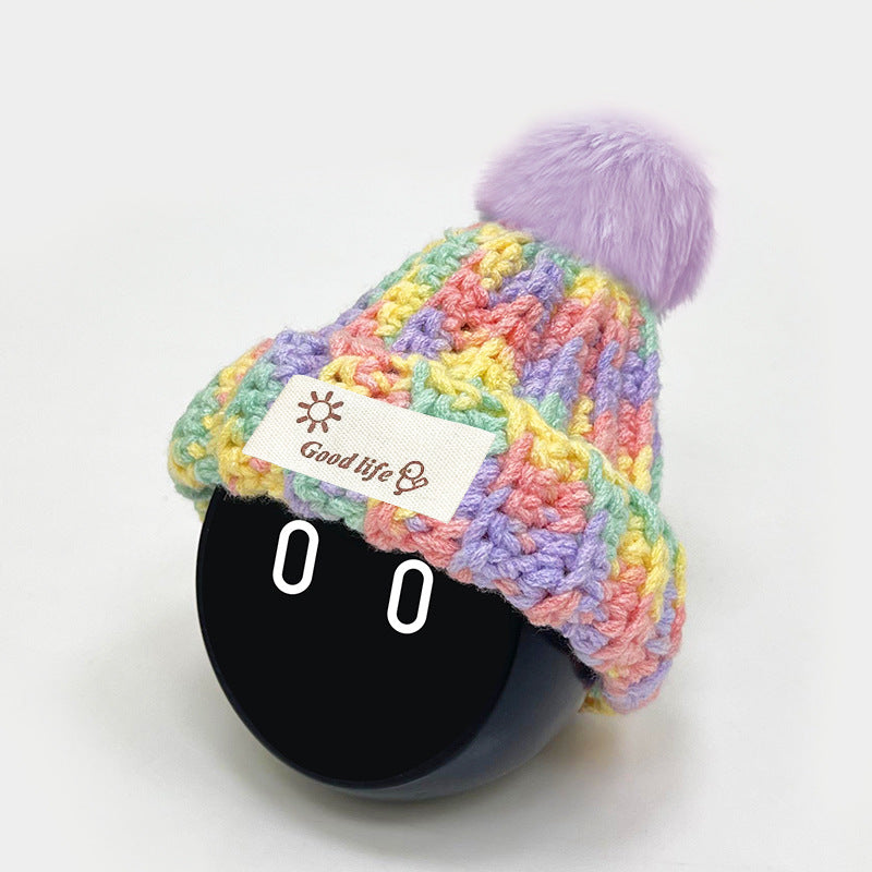 This beanie is knitted from a mixture of different colored yarns, and the color is looks like candy.