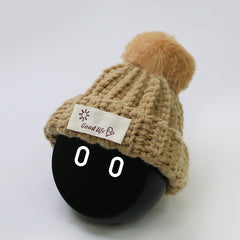 The Khaki Wool hat worn on NOMI.